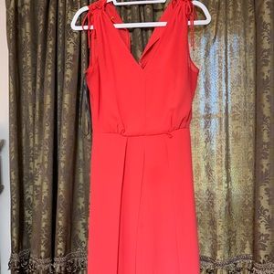 Vince Camuto jumpsuit, size 4. Color is bright berry reddish.  Slight Palazzo.